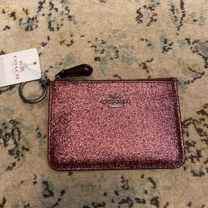 Coach coin purse, sparkly dark pink.